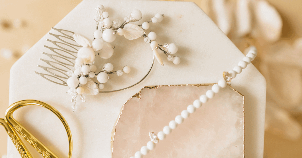 A vintage pearl necklace is a pre-owned string of pearls, typically at least 20-100 years old, prized for its unique character, historical significance, and often superior quality compared to modern counterparts, making it a coveted piece for collectors and fashion connoisseurs alike.