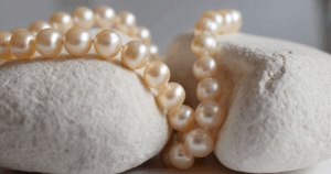 Home 36 A vintage pearl necklace is a pre-owned string of pearls, typically at least 20-100 years old, prized for its unique character, historical significance, and often superior quality compared to modern counterparts, making it a coveted piece for collectors and fashion connoisseurs alike.