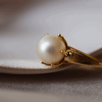 custom pearl engagement ring. Our expert guide covers pearl types,